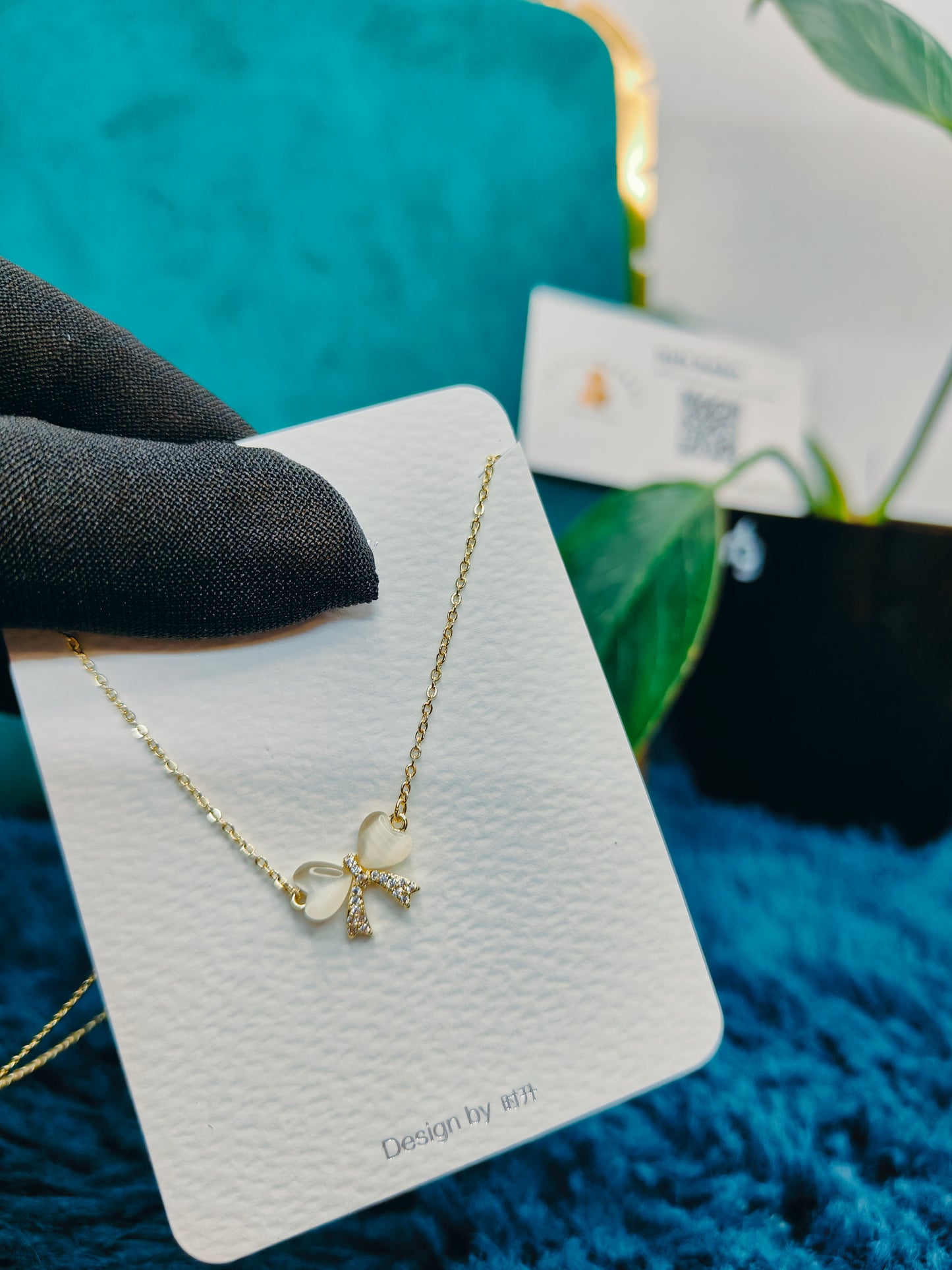 Gold Bow With Heart Shape Stone Necklace